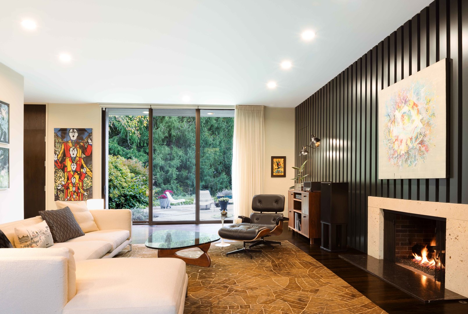 296 White Oak Lane Winnetka, IL 60093 - Photo 10 of 42 a living room with furniture fireplace and a large window