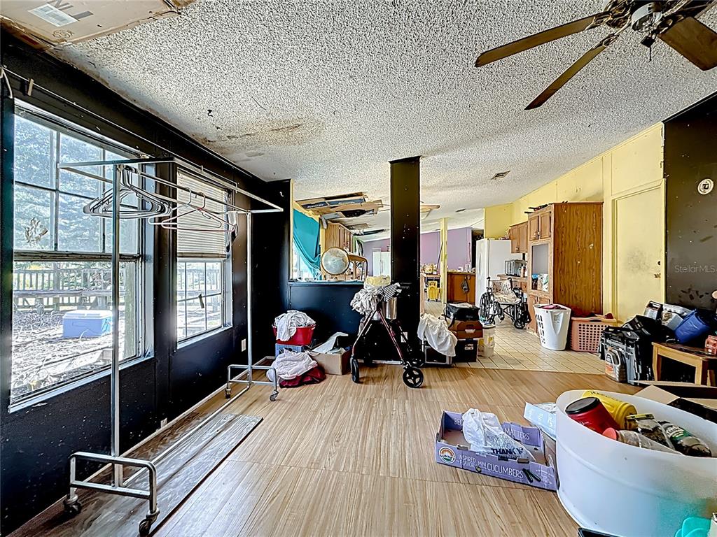 2414 Brock Road Plant City, FL 33565 - Photo 22 of 63 a very nice looking room with many windows and furniture