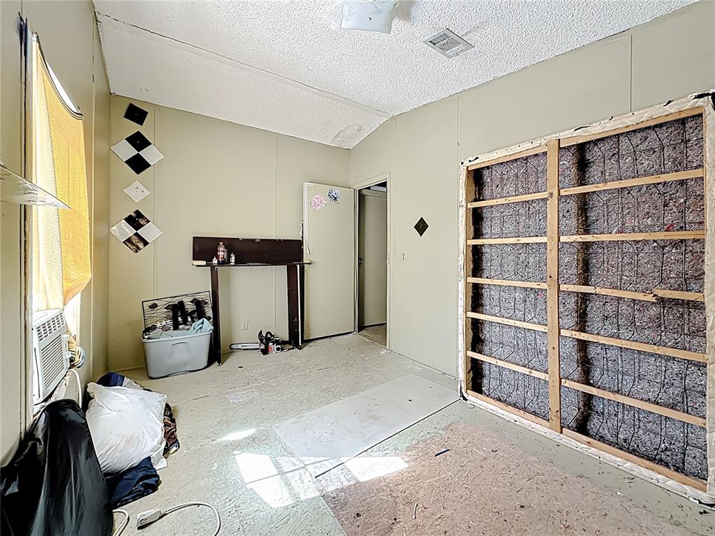 2414 Brock Road Plant City, FL 33565 - Photo 27 of 63 a bedroom with a bed and closet