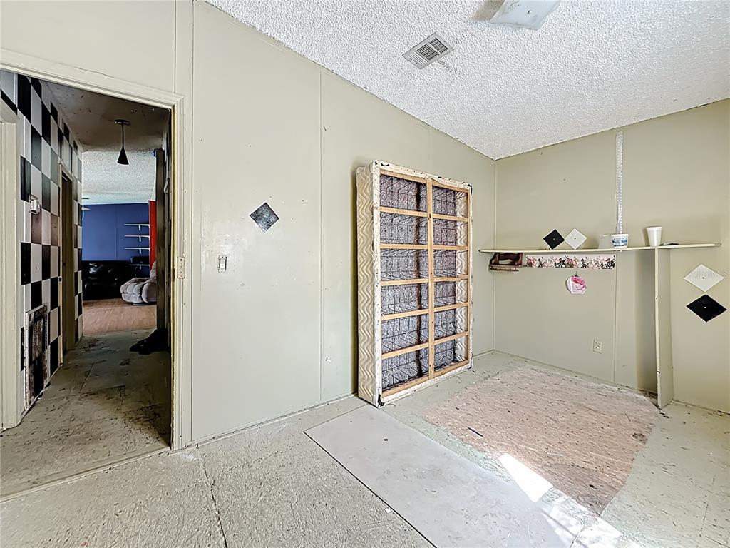 2414 Brock Road Plant City, FL 33565 - Photo 28 of 63 a view of a livingroom with a bedroom and bathroom