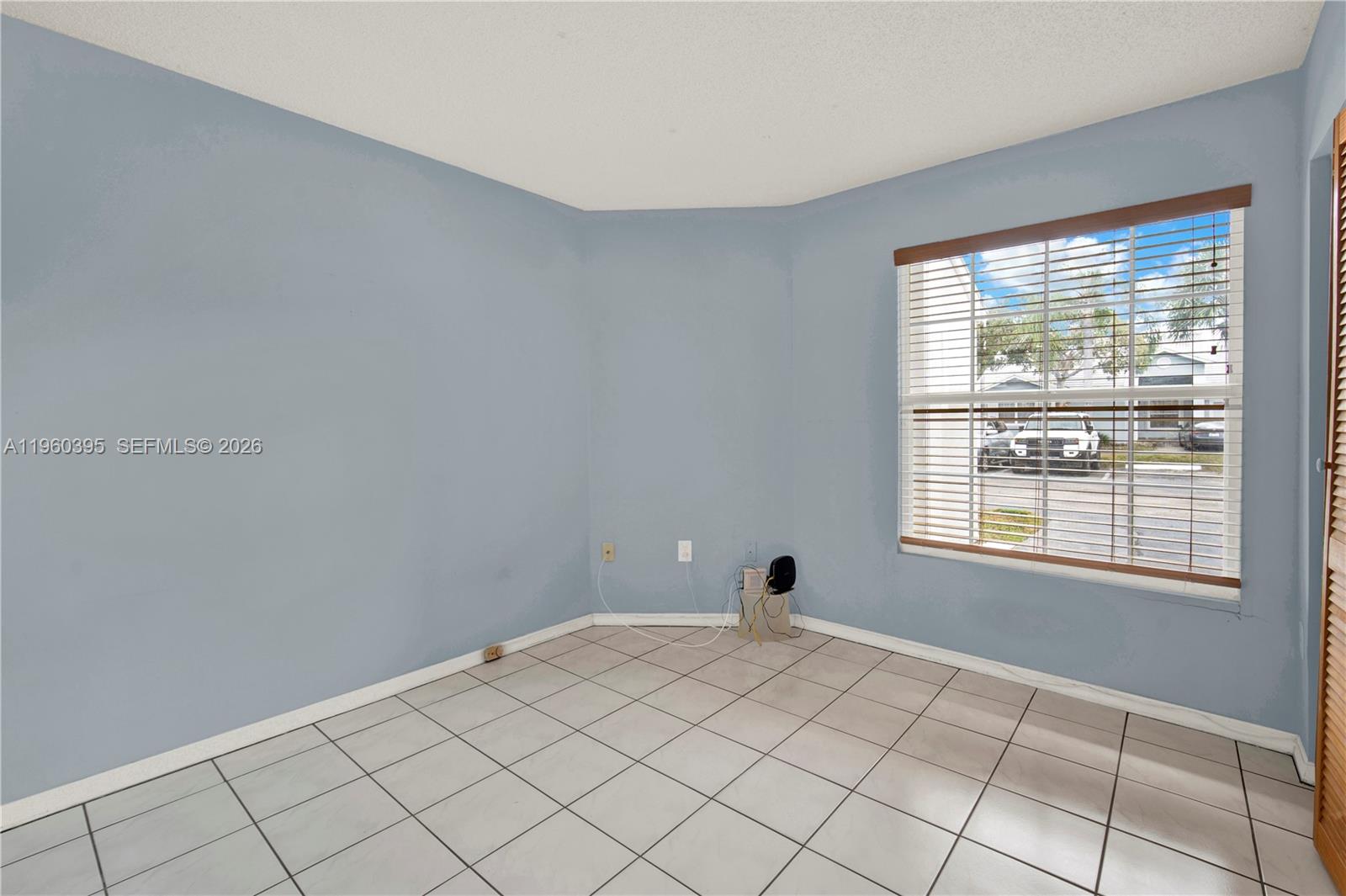 11321 Southwest 62nd Lane Miami, FL 33173 - Photo 26 of 43 a view of an empty room and window