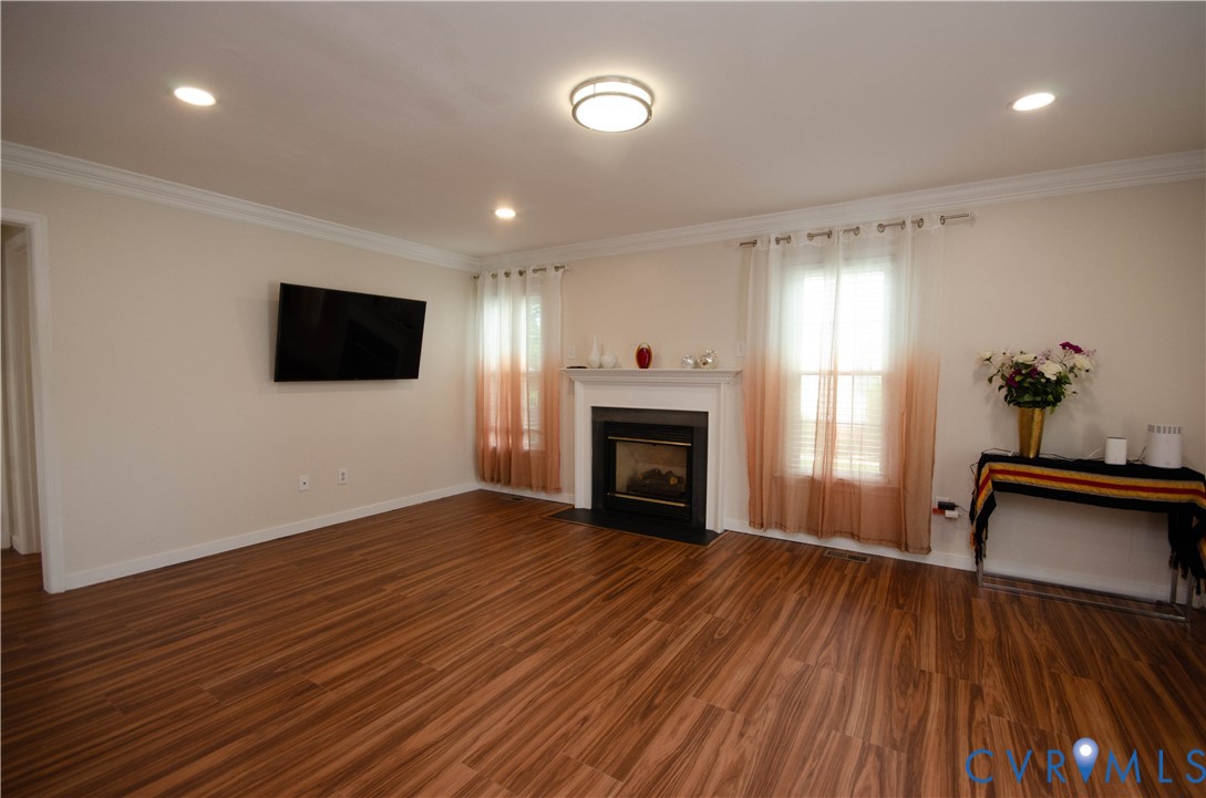 10912 Point Grey Road Henrico, VA 23233 - Photo 10 of 36 Wood-finish flooring, recessed lighting, crown mol