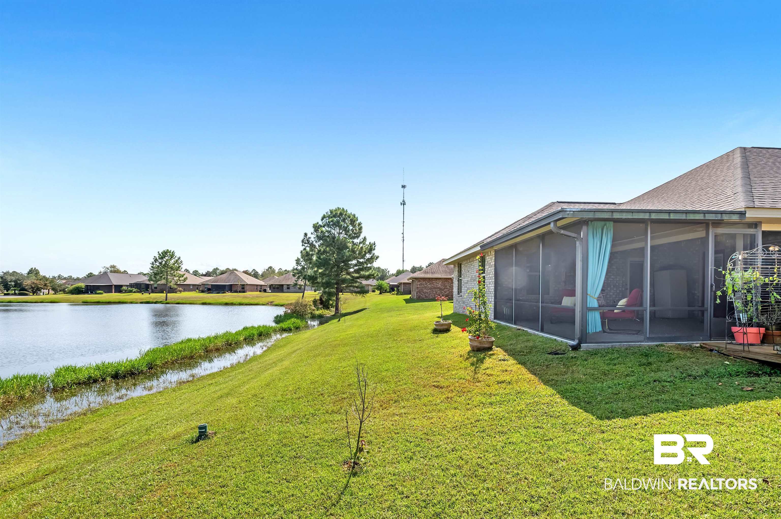 8896 Allay Lane Foley, AL 36535 - Photo 8 of 57 View of yard featuring a water view and a sunroom
