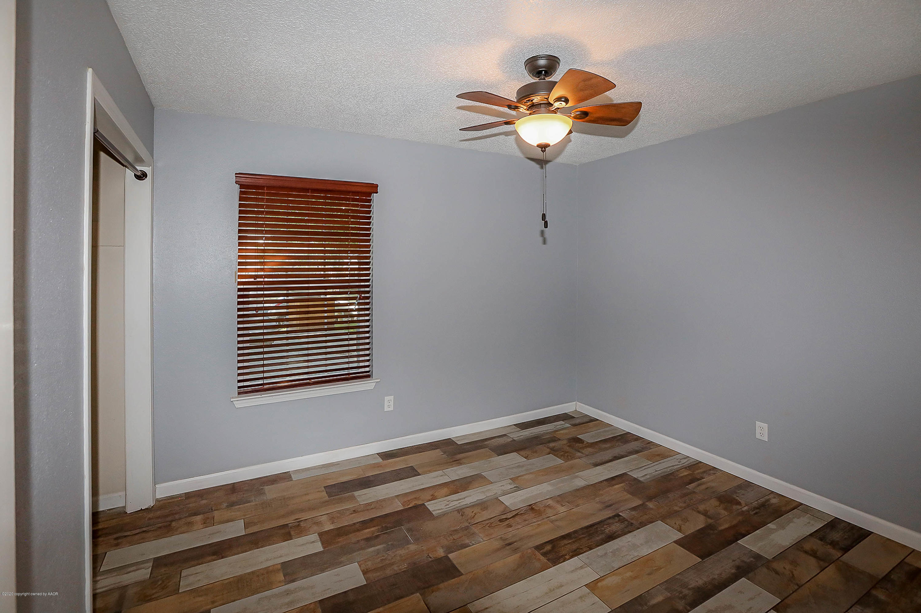2802 Shield Court Amarillo, TX 79110 - Photo 18 of 32 a very nice looking room with a window