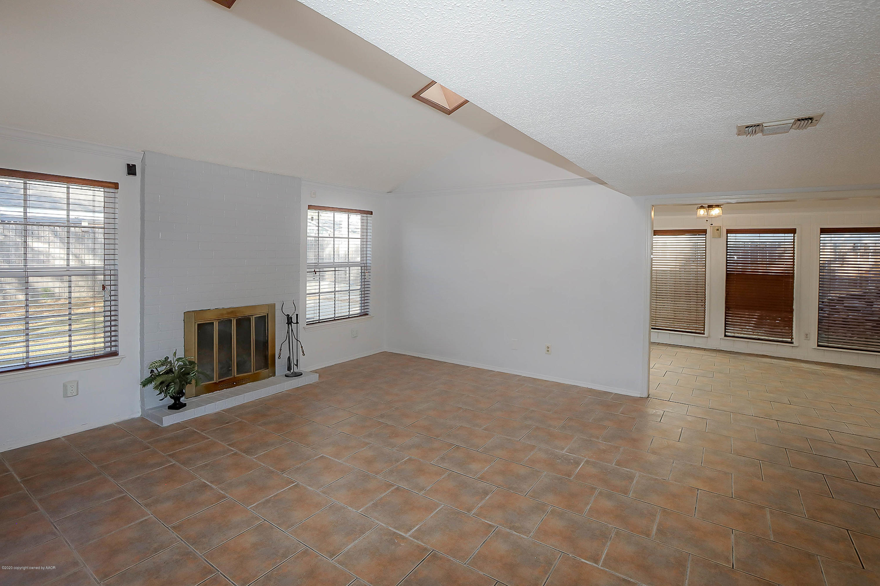 2802 Shield Court Amarillo, TX 79110 - Photo 8 of 32 an empty room with windows