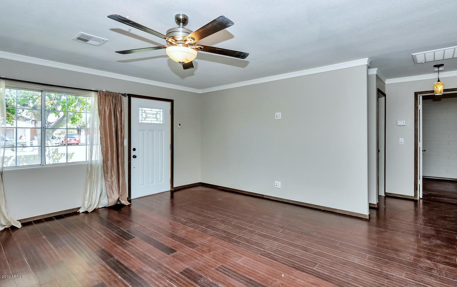 1717 West Pecan Road Phoenix, AZ 85041 - Photo 9 of 25 1717 W Pecan Rd-large-005-022-Main Livin