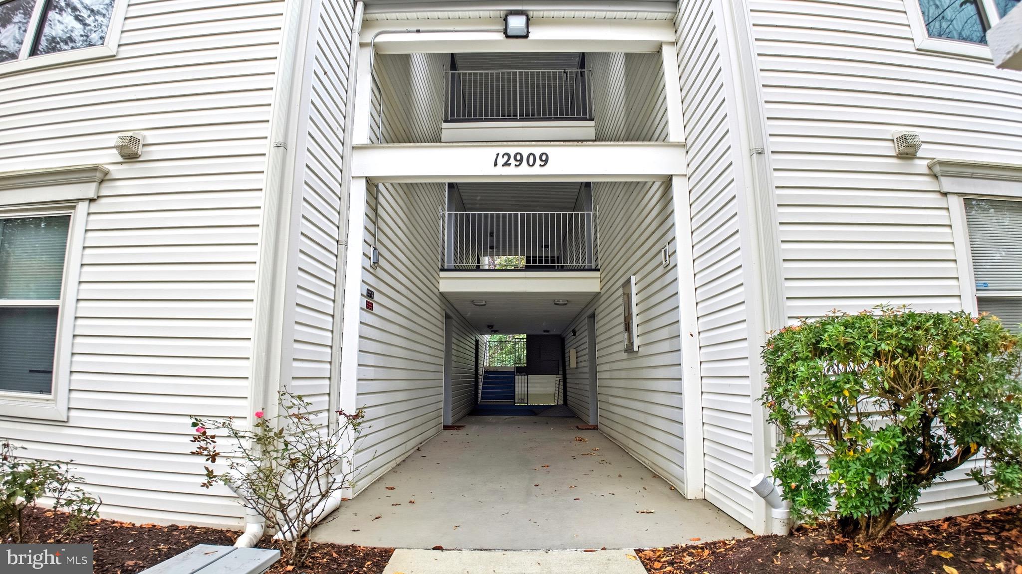 12909 Churchill Ridge Circle, Unit 12 Germantown, MD 20874 - Photo 1 of 44 a view of an entrance of the house