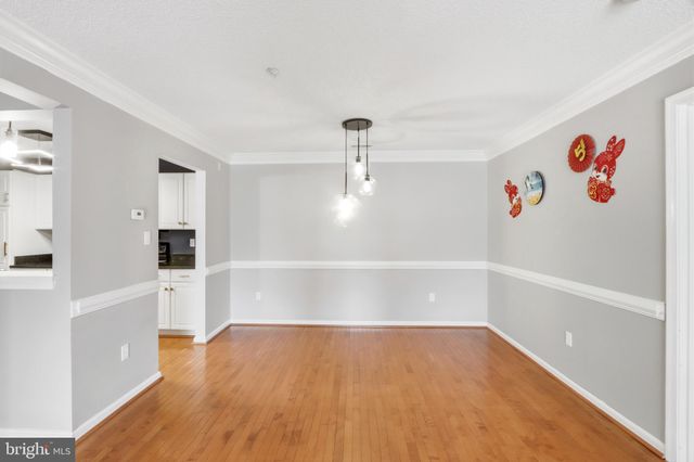 a close view of a utility room with dryer and washer