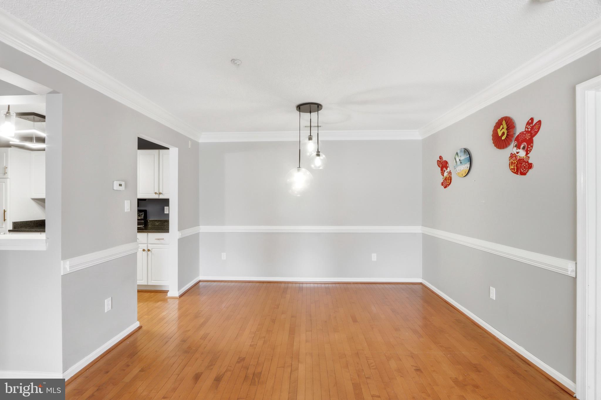 12909 Churchill Ridge Circle, Unit 12 Germantown, MD 20874 - Photo 17 of 44 a view of empty room with wooden floor