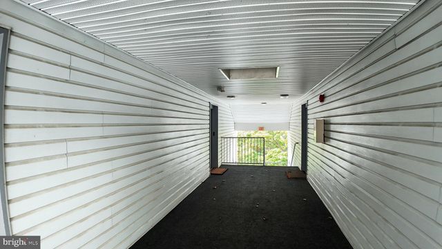 a view of a balcony with window
