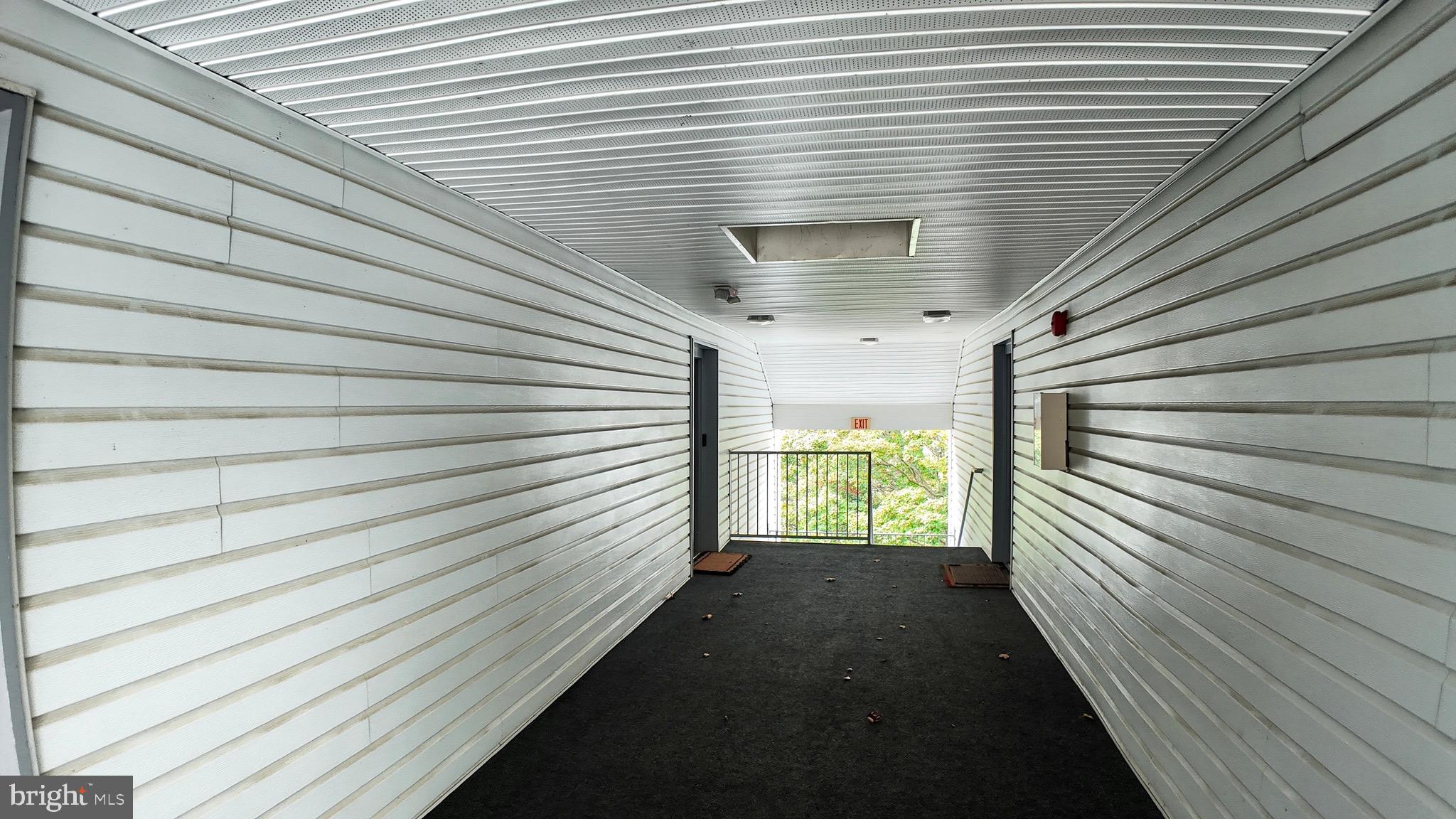 12909 Churchill Ridge Circle, Unit 12 Germantown, MD 20874 - Photo 2 of 44 a view of a balcony with window