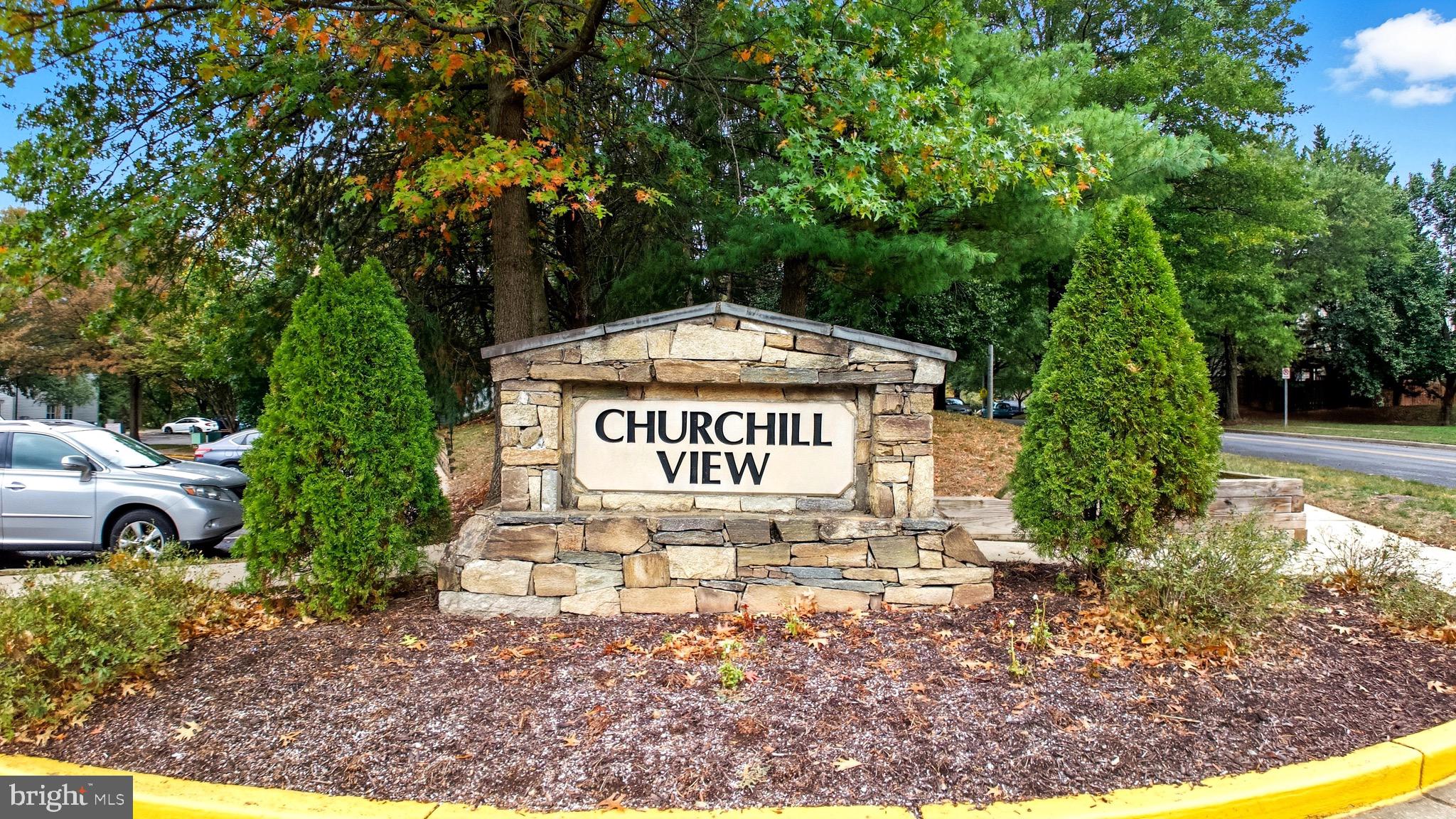12909 Churchill Ridge Circle, Unit 12 Germantown, MD 20874 - Photo 6 of 44 a sign of golf club on a wall
