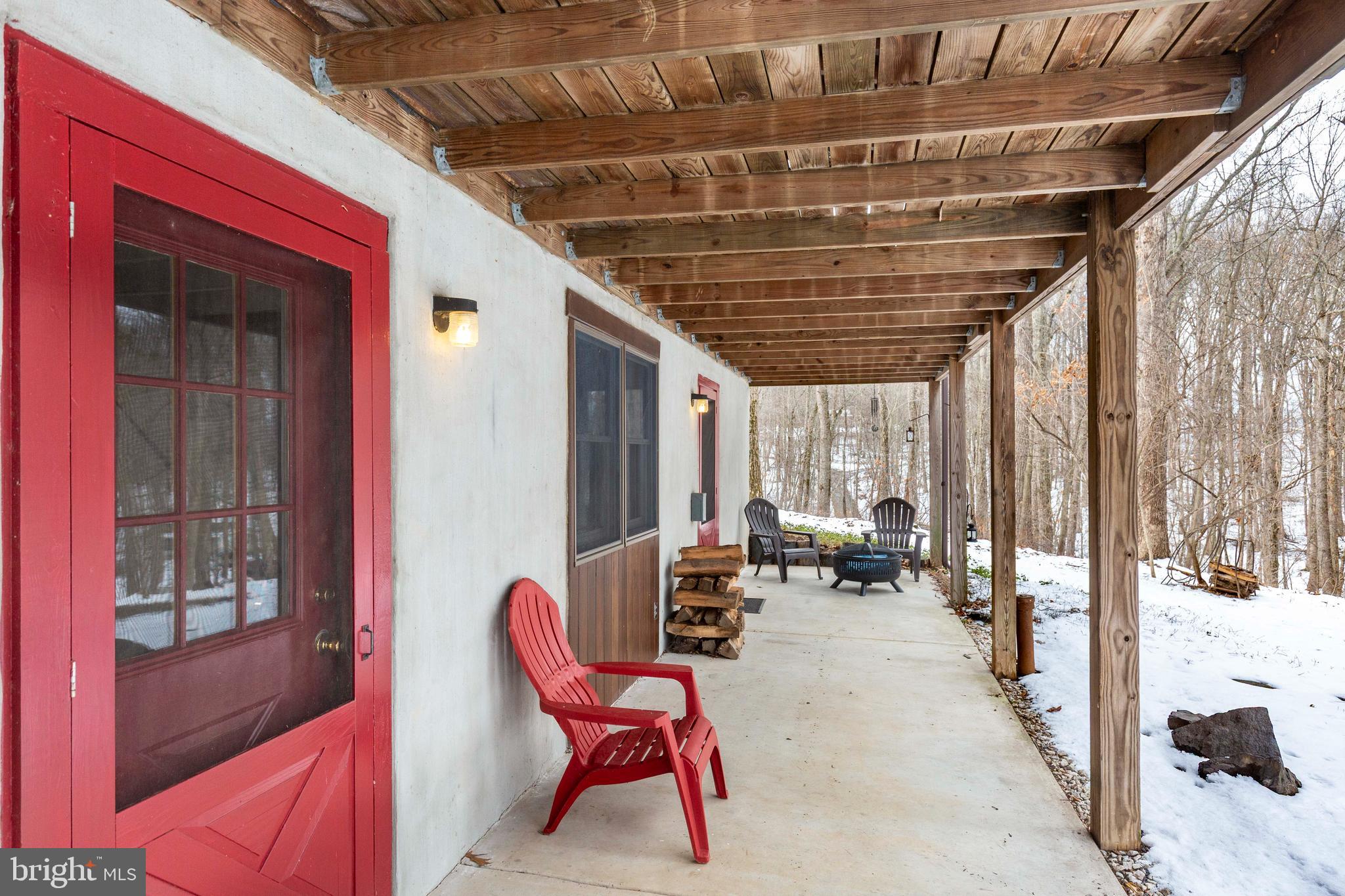 385 Silver Run Valley Road Westminster, MD 21158 - Photo 13 of 59 a balcony with chairs and outdoor space