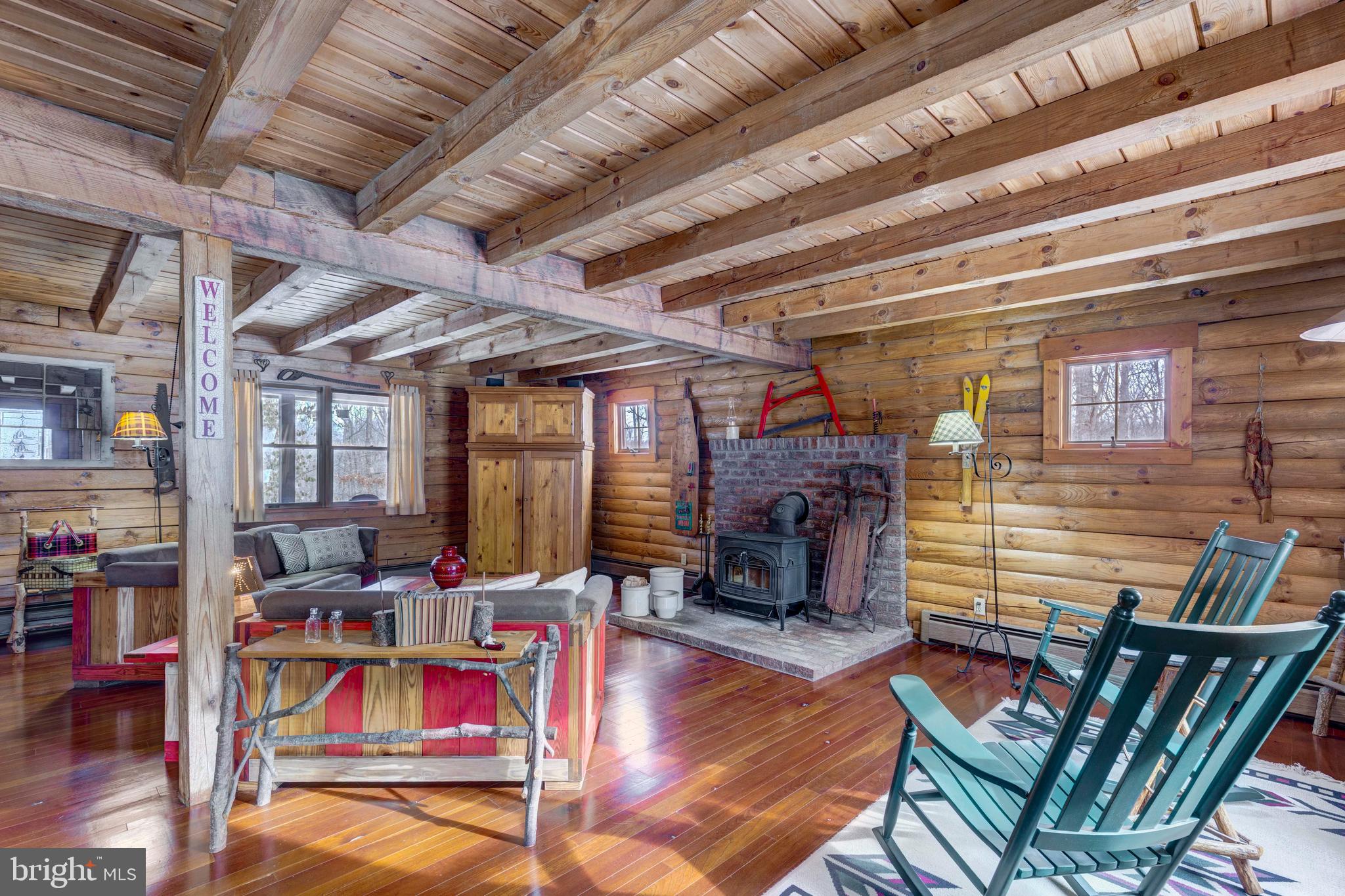 385 Silver Run Valley Road Westminster, MD 21158 - Photo 16 of 59 a living room with furniture oven and a fireplace