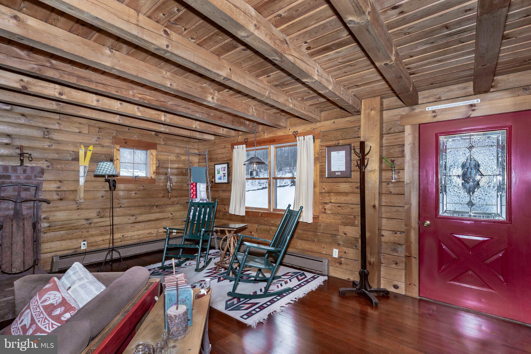 385 Silver Run Valley Road Westminster, MD 21158 - Photo 17 of 59 a work room with furniture wooden floor and next to a window