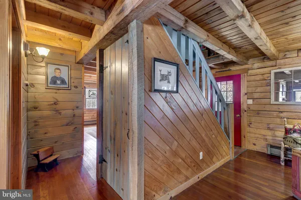a room with furniture and a wooden floor