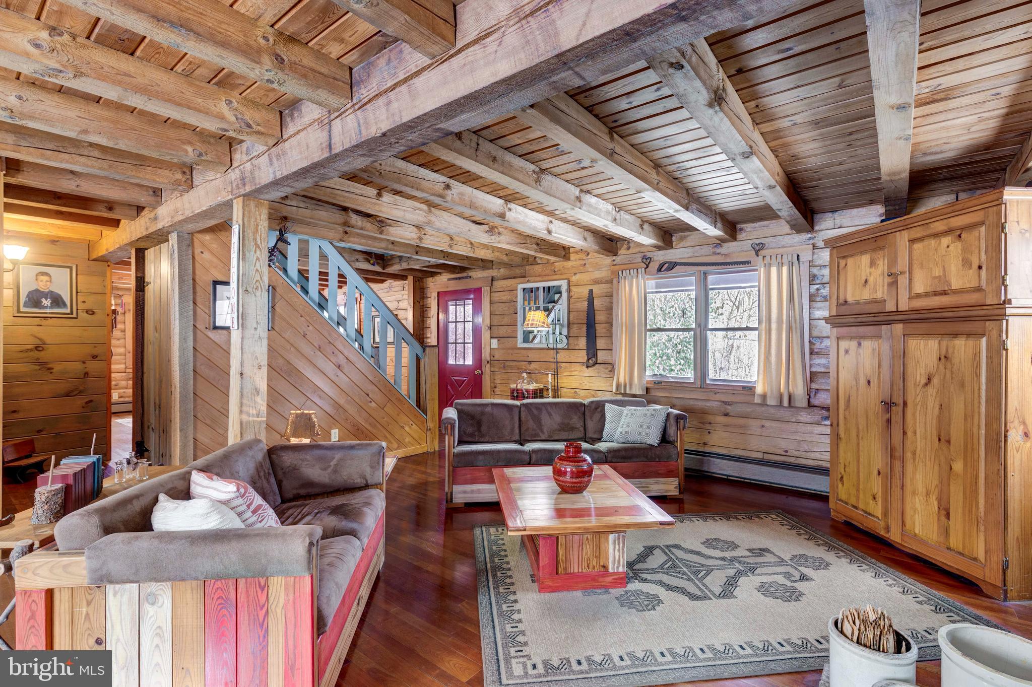 385 Silver Run Valley Road Westminster, MD 21158 - Photo 23 of 59 a living room with furniture and a window