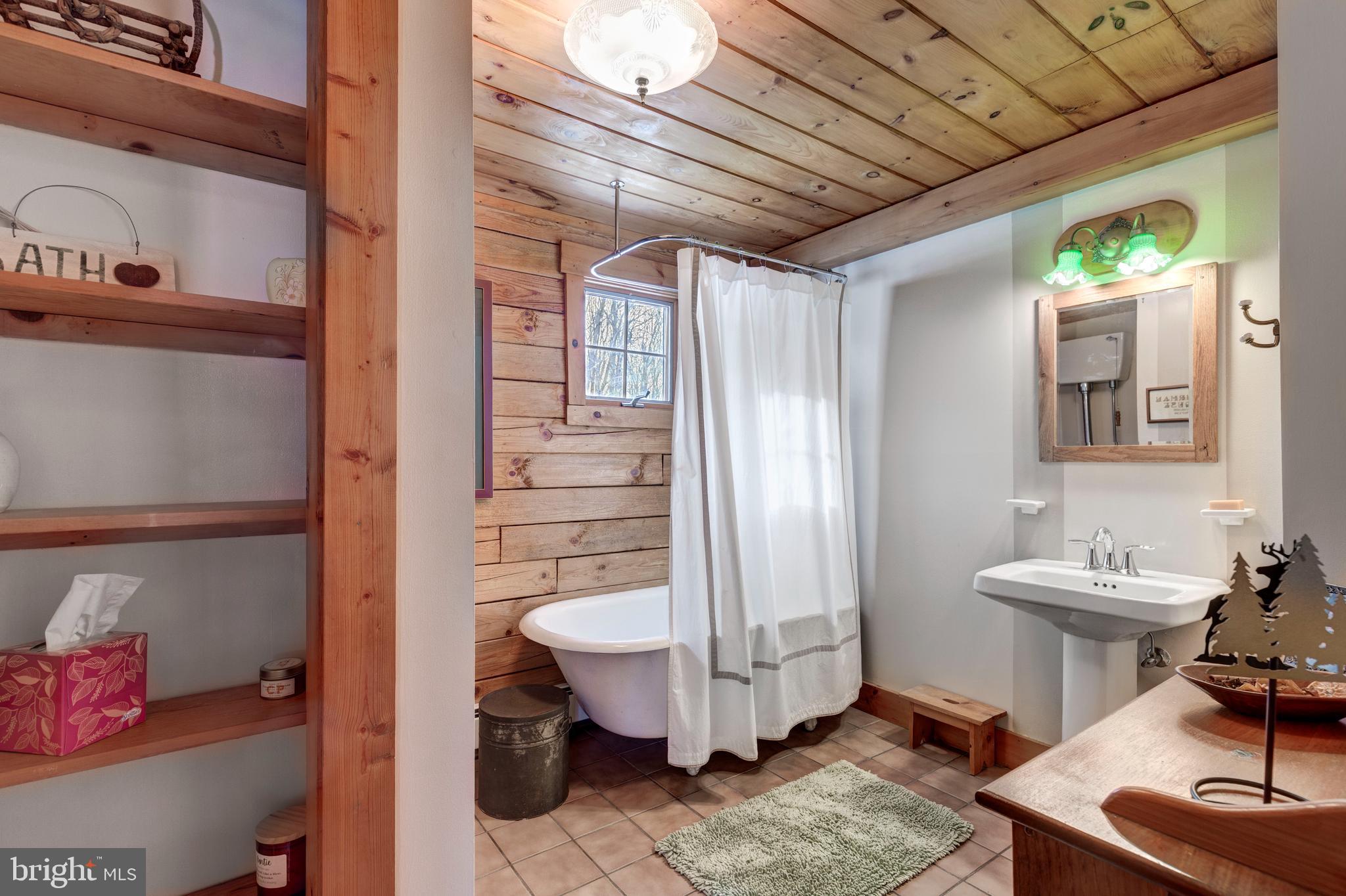 385 Silver Run Valley Road Westminster, MD 21158 - Photo 33 of 59 a room with furniture and a wooden floor