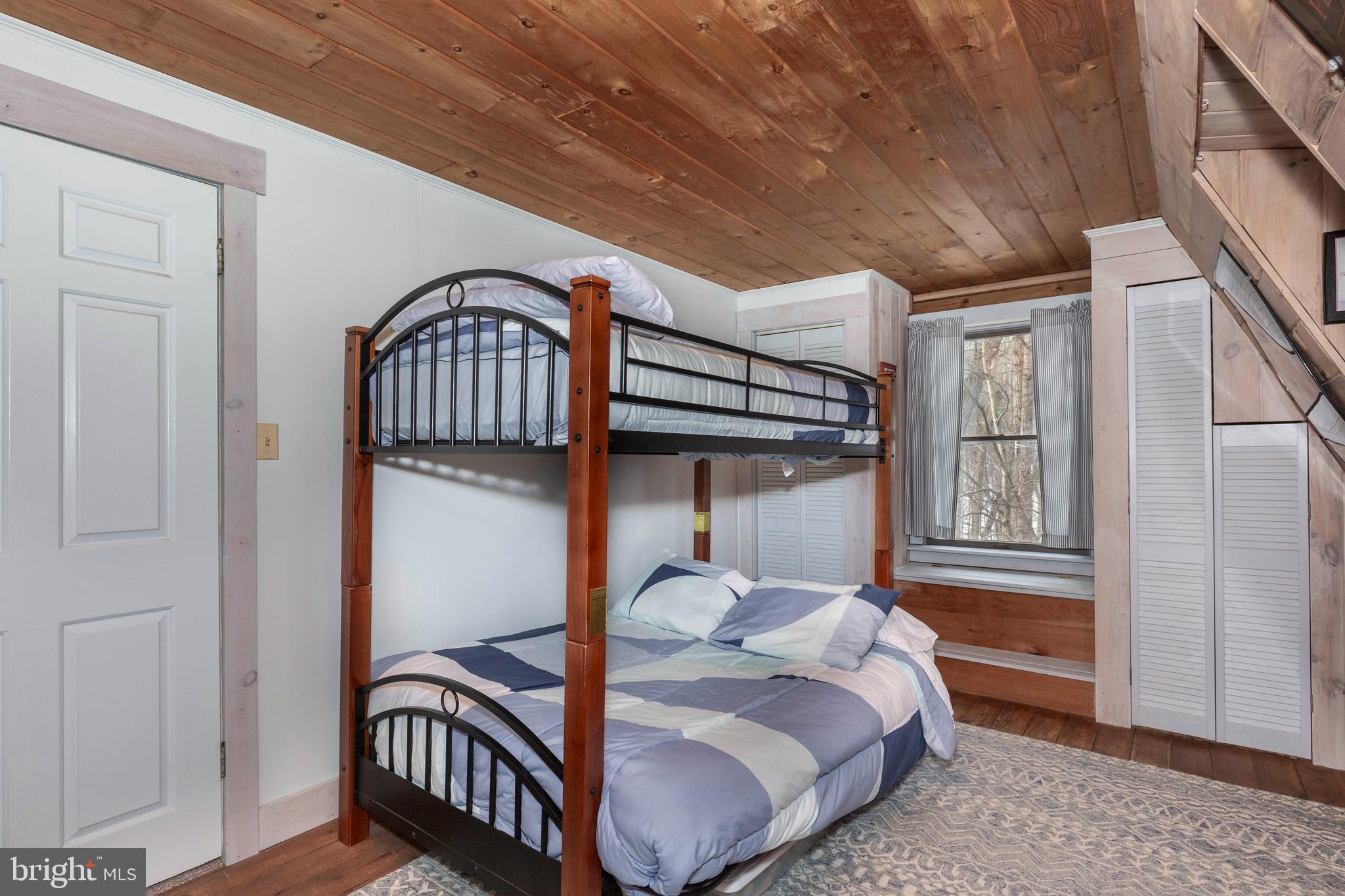 385 Silver Run Valley Road Westminster, MD 21158 - Photo 46 of 59 a bedroom with bed and a window