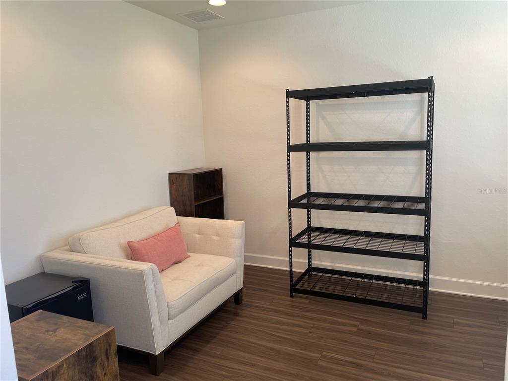 33 Deer Road Frostproof, FL 33843 - Photo 14 of 64 a bedroom with a bed and a window