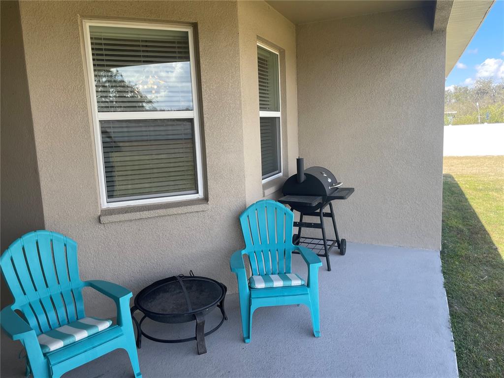 33 Deer Road Frostproof, FL 33843 - Photo 49 of 64 a living room with furniture and a window