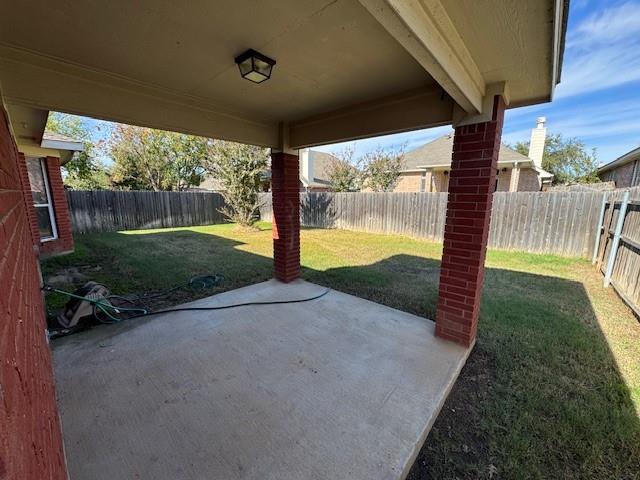 8353 Riversprings Drive Fort Worth, TX 76053 - Photo 18 of 20 Fenced backyard with a patio area