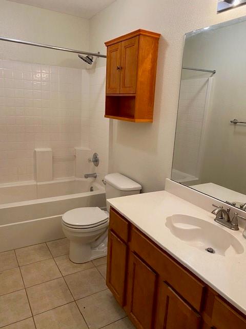 8353 Riversprings Drive Fort Worth, TX 76053 - Photo 4 of 20 Full bathroom with vanity, bathing tub / shower combination, and light tile patterned flooring