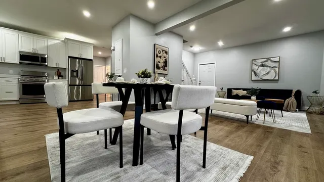 a view of a dining room with furniture