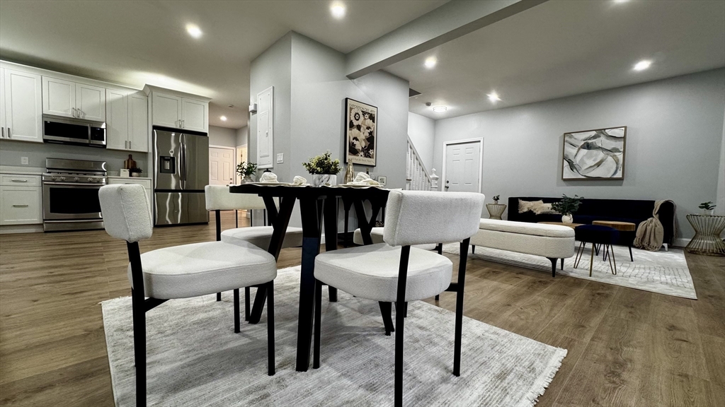 83 Arnold Street Methuen, MA 01844 - Photo 11 of 42 a view of a dining room with furniture