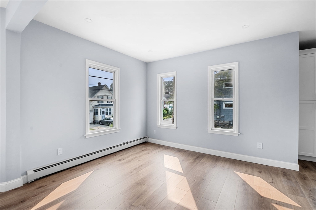 83 Arnold Street Methuen, MA 01844 - Photo 15 of 42 an empty room with windows