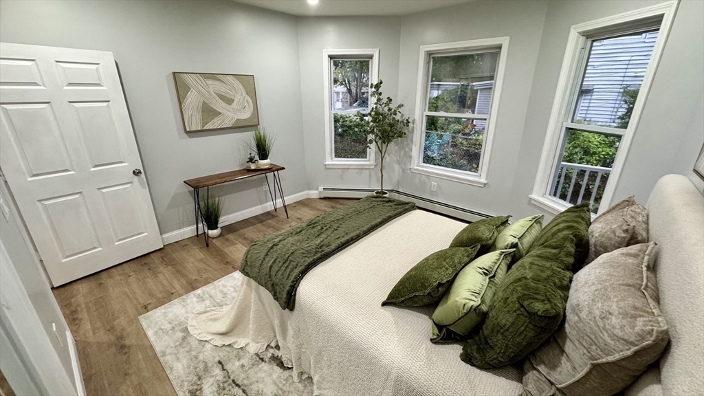 83 Arnold Street Methuen, MA 01844 - Photo 21 of 42 a bedroom with a bed and a window