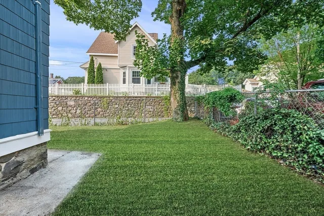 a view of a house with a garden
