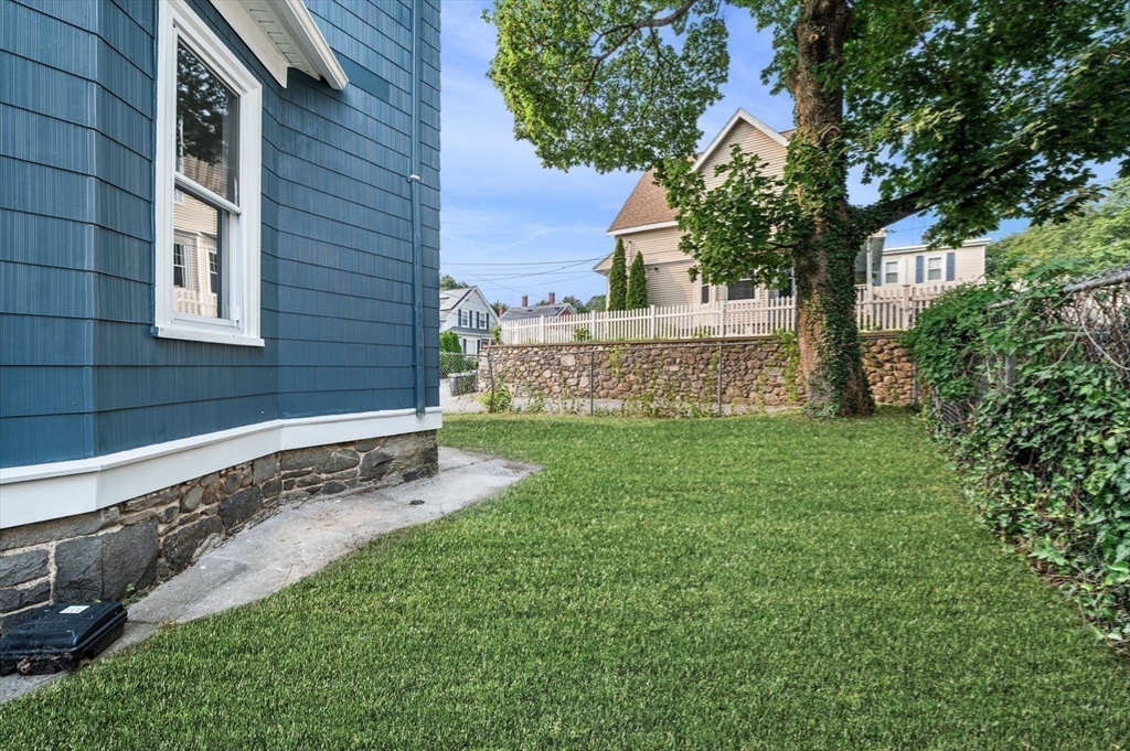 83 Arnold Street Methuen, MA 01844 - Photo 42 of 42 a view of a house with a garden
