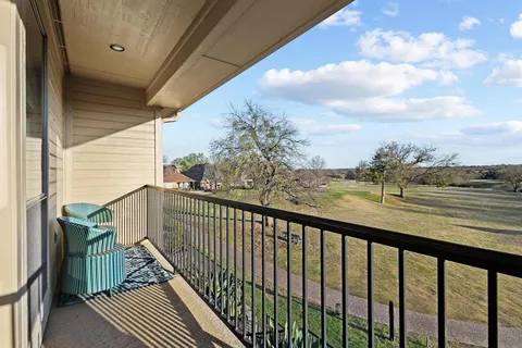 a view of a balcony with couch