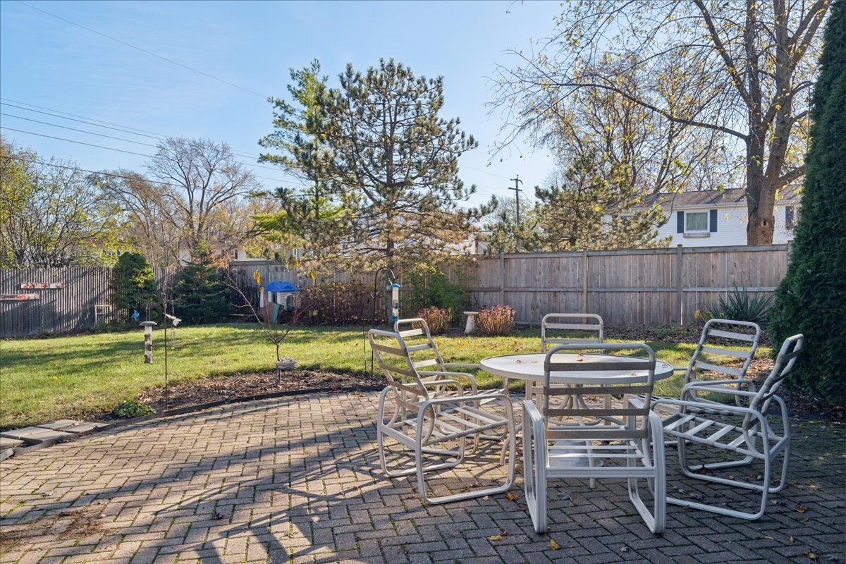 203 Pine Street Deerfield, IL 60015 - Photo 18 of 24 a view of a chairs and table in the patio