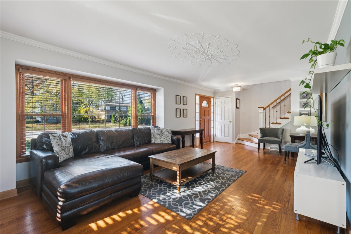 203 Pine Street Deerfield, IL 60015 - Photo 3 of 24 a living room with furniture and a large window