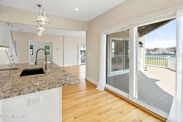 a view of a living room and front door