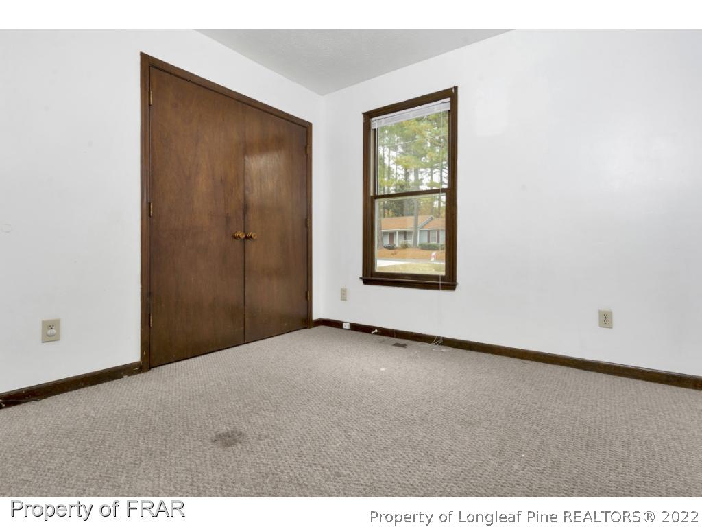1758 Rim Road Fayetteville, NC 28314 - Photo 14 of 25 a view of an empty room with a window