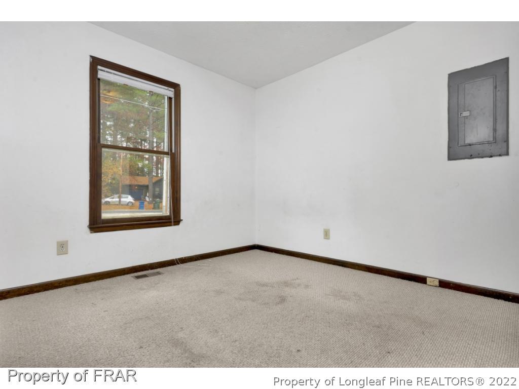 1758 Rim Road Fayetteville, NC 28314 - Photo 16 of 25 a view of an empty room with a window
