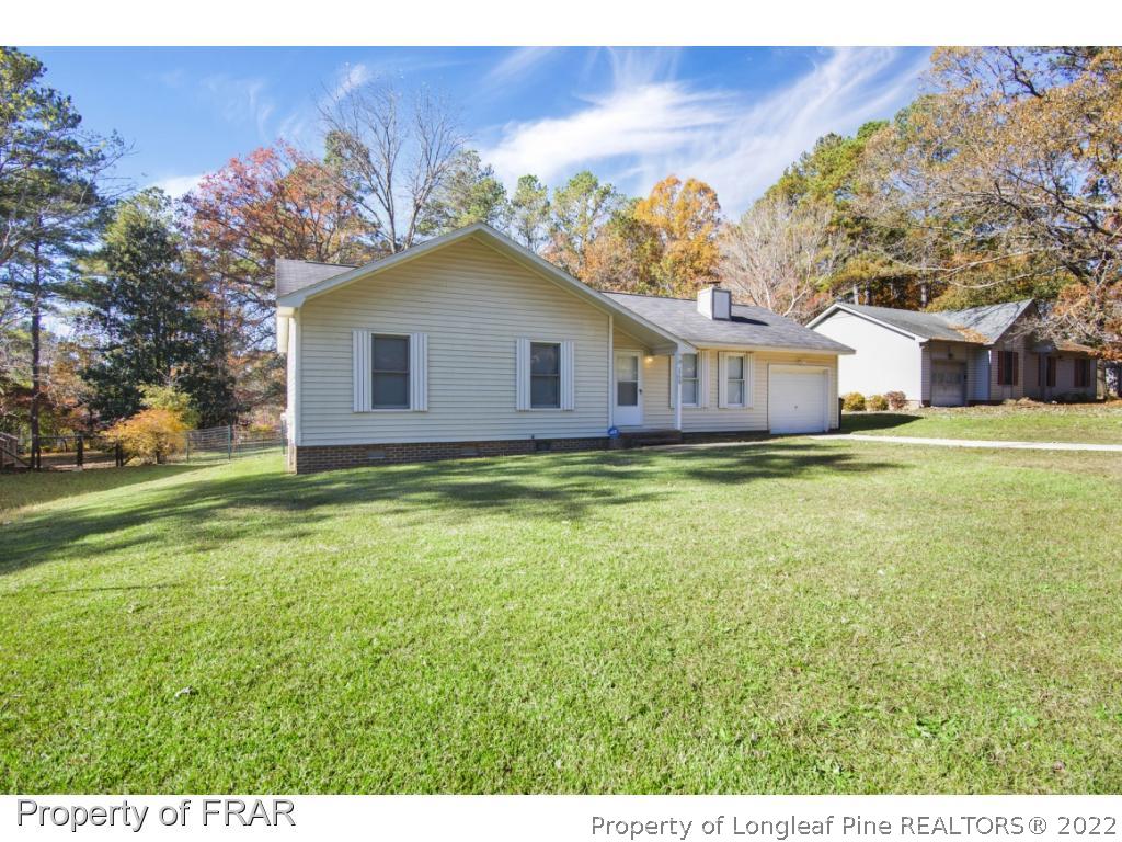 1758 Rim Road Fayetteville, NC 28314 - Photo 25 of 25 a house with a garden