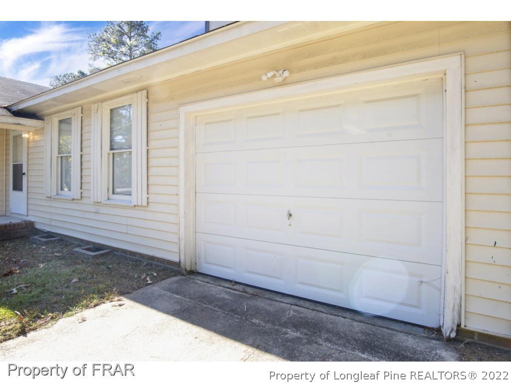 1758 Rim Road Fayetteville, NC 28314 - Photo 3 of 25 a view of wooden door