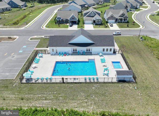 an aerial view of a house with outdoor space pool patio and outdoor seating