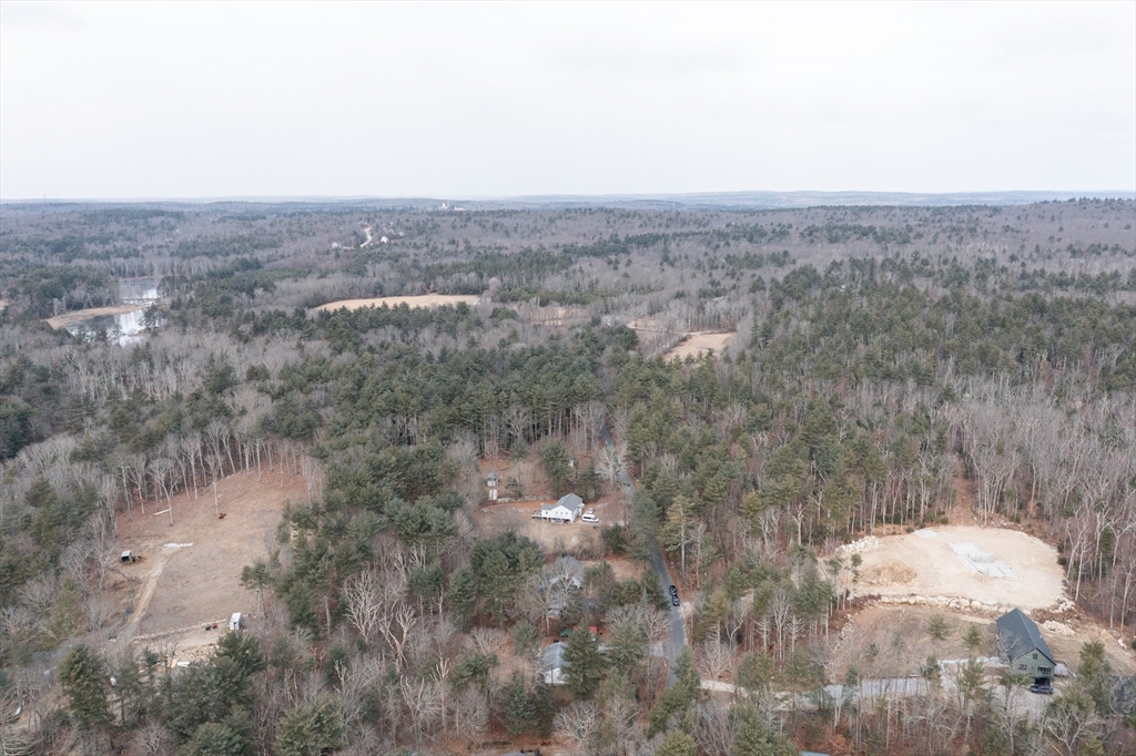 104 Vine Street Douglas, MA 01516 - Photo 4 of 8 an aerial view of house with yard and mountain view in back