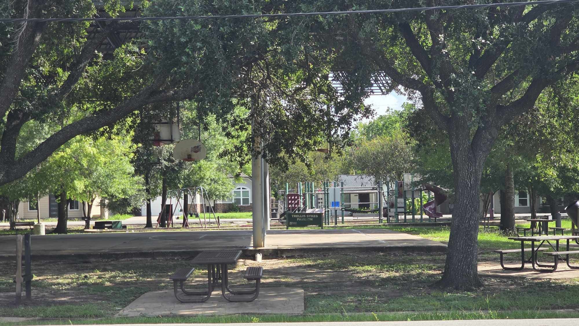 4532 Briscoe Street Houston, TX 77051 - Photo 14 of 14 a view of a house with garden and trees