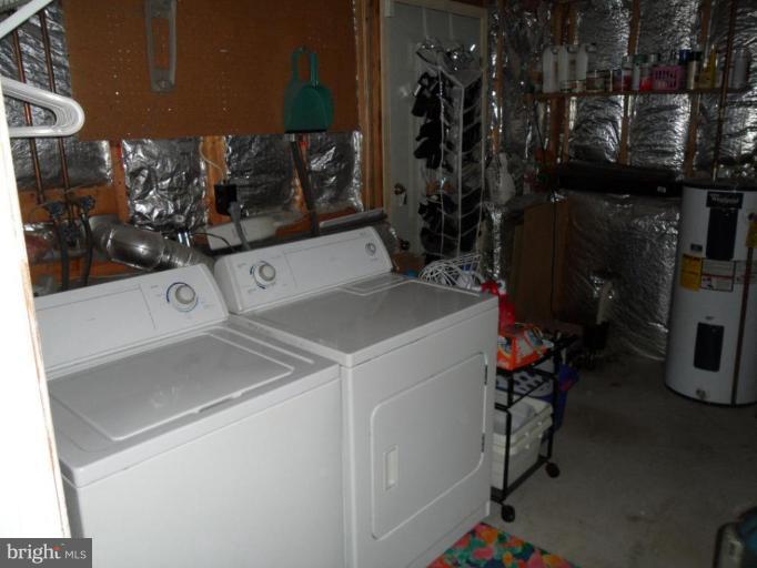 5057 Clifford Road Perry Hall, MD 21128 - Photo 12 of 13 a utility room with dryer and washer