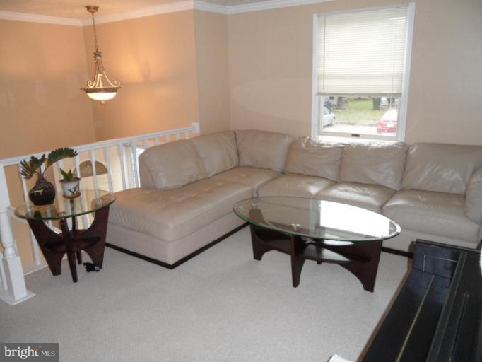 5057 Clifford Road Perry Hall, MD 21128 - Photo 3 of 13 a living room with furniture and a window