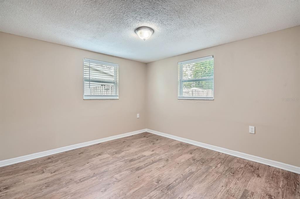 5429 Flora Avenue Holiday, FL 34690 - Photo 22 of 33 an empty room with a window