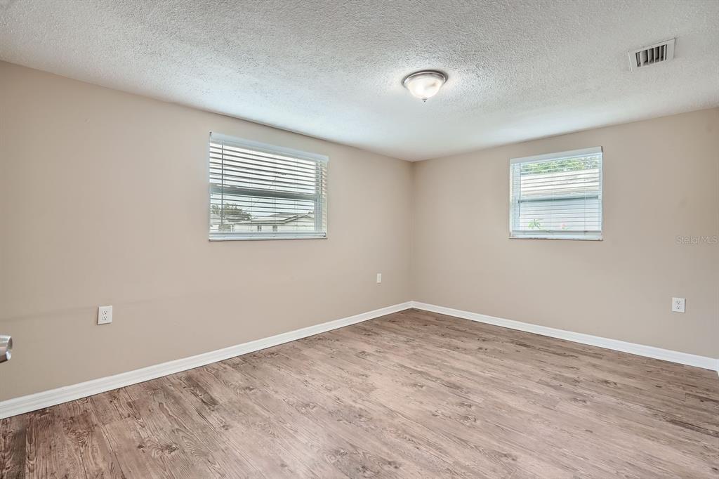 5429 Flora Avenue Holiday, FL 34690 - Photo 24 of 33 an empty room with a window