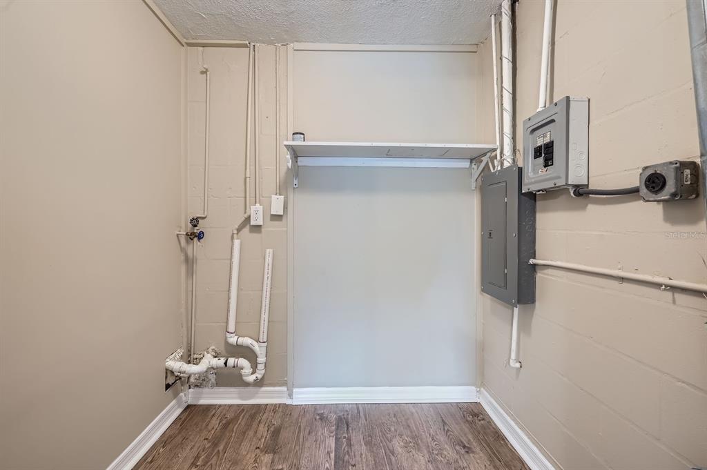5429 Flora Avenue Holiday, FL 34690 - Photo 29 of 33 a view of walk in closet with empty racks
