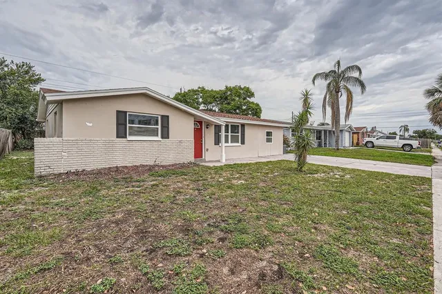 a house view with a garden space